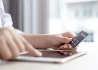 bancnet atm card being held in a hand, symbolizing secure and convenient banking services