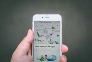 user holding a phone to pay for airline and bus tickets online, enjoying convenient digital payments through bancnet