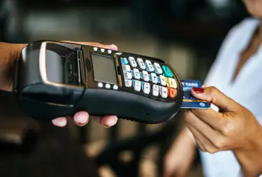bancnet user using a card on a payment machine for secure transaction processing
